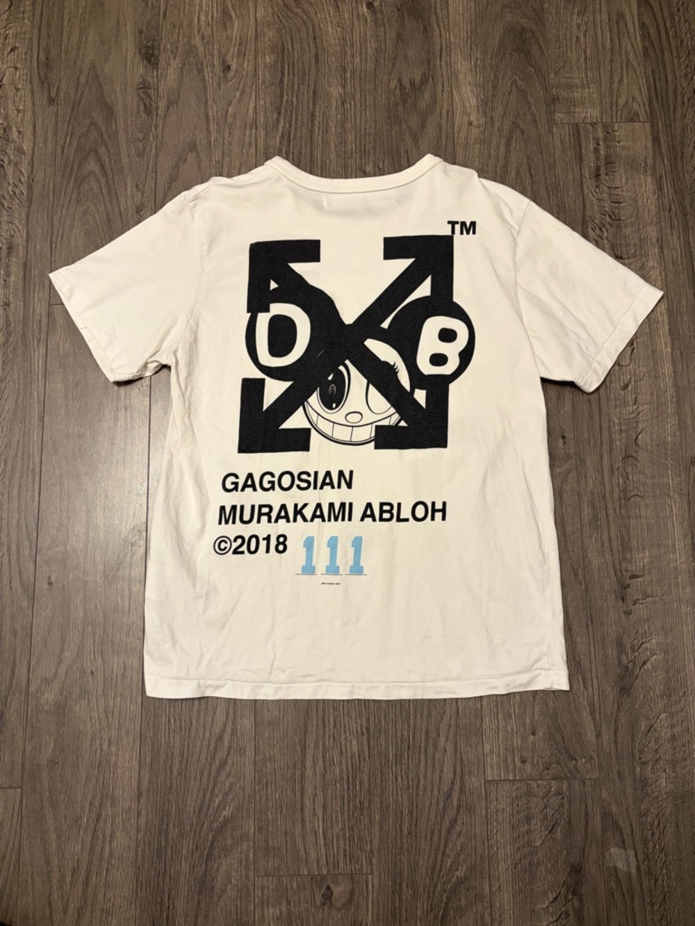 Off-White White Tee with Black Graphic and Blue Accent